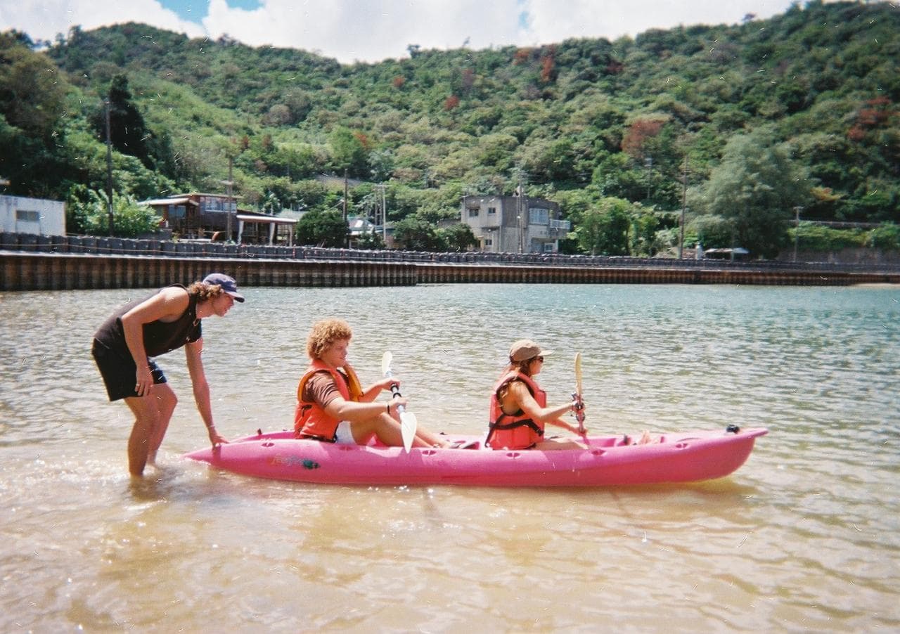 Guests kayaking in Okinawa on tour